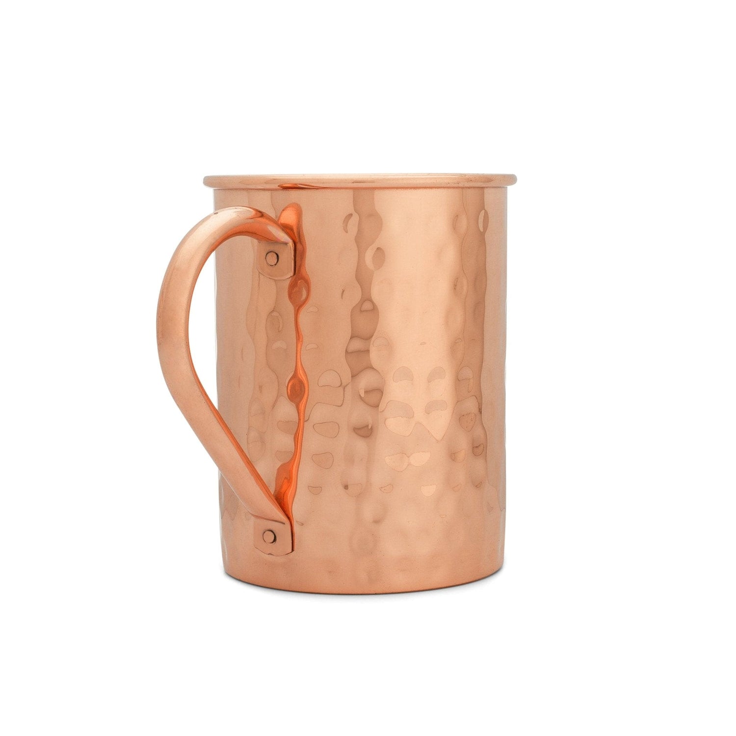 Close-up of a beautifully handcrafted copper mug, showcasing its hammered texture and polished finish. The warm glow of pure copper reflects the artistry and tradition behind each piece, highlighting the unique craftsmanship of skilled artisans.